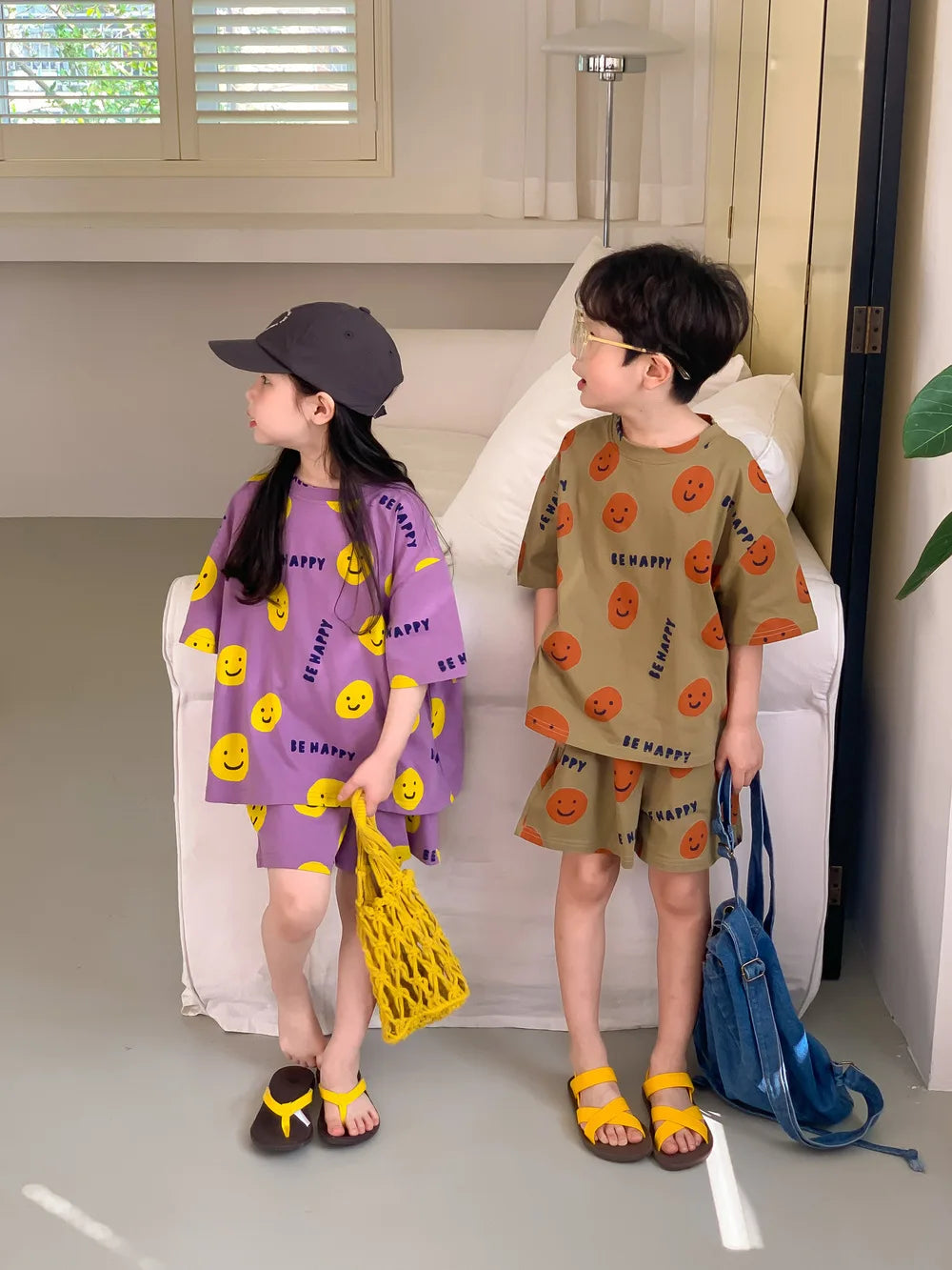 Summer T-shirt  Children's Casual Suit  Men's and Women's Short Sleeved Shorts  Cartoon Smiling Face Print Two-piece Set